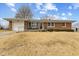 Charming brick ranch home featuring a well-maintained lawn and attached single-car garage at 488 N 24Th Ave, Beech Grove, IN 46107