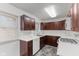 Well-equipped kitchen with stainless steel appliances and ample cabinet space at 488 N 24Th Ave, Beech Grove, IN 46107