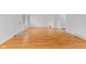 Light-filled living room with hardwood floors, fresh paint, and large windows at 488 N 24Th Ave, Beech Grove, IN 46107