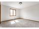 Bedroom with neutral carpet, ample natural light, and wooden trim at 5015 Watersite Cir, Indianapolis, IN 46254