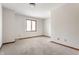 Bedroom with neutral carpet, ample natural light, and wooden trim at 5015 Watersite Cir, Indianapolis, IN 46254