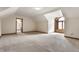 Spacious bonus room with an arched window and plenty of natural light at 5015 Watersite Cir, Indianapolis, IN 46254