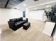 Spacious carpeted basement featuring a comfortable seating area, entertainment center and a barndoor at 504 S Main St, Waldron, IN 46182