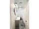 Modern bathroom featuring a stylish vanity, updated fixtures, and a shower with a curtain at 504 S Main St, Waldron, IN 46182