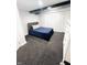 Cozy bedroom with carpet, a comfortable bed, and ample natural light, ideal for relaxation at 504 S Main St, Waldron, IN 46182