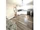 Updated kitchen with granite counters, sleek black appliances, and ample cabinetry at 504 S Main St, Waldron, IN 46182