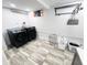 Functional laundry room equipped with modern appliances, tile floors, and efficient storage solutions at 504 S Main St, Waldron, IN 46182