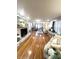 Open-concept living room with a cozy fireplace and plenty of seating at 504 S Main St, Waldron, IN 46182