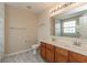 Bathroom with double sink vanity, and a white toilet and walls at 5344 Misthaven Ln, Greenwood, IN 46143