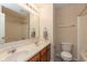 Bathroom with a double vanity, neutral walls, and bright lighting at 5344 Misthaven Ln, Greenwood, IN 46143