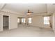 Spacious main bedroom with tray ceilings, large windows and walk-in closet at 5344 Misthaven Ln, Greenwood, IN 46143