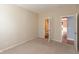 Inviting bedroom features neutral carpet and paint, and access to an ensuite bathroom at 5344 Misthaven Ln, Greenwood, IN 46143