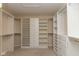 Walk-in closet with custom shelving and drawers offers ample storage at 5344 Misthaven Ln, Greenwood, IN 46143