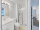 Well-lit bathroom with a stand-up shower and modern vanity at 5721 Rosemont Ct, Indianapolis, IN 46254