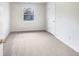 Bedroom featuring neutral walls and carpet with a view from the window at 5721 Rosemont Ct, Indianapolis, IN 46254