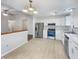 Bright kitchen features stainless steel appliances, white cabinets, and modern fixtures at 5721 Rosemont Ct, Indianapolis, IN 46254