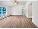 Bright living room boasting hardwood floors, and a large window for ample light at 5721 Rosemont Ct, Indianapolis, IN 46254