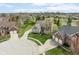 Aerial view featuring a well-maintained neighborhood with mature trees and manicured lawns at 5769 Marsh Glen Ct, Carmel, IN 46033