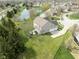 Aerial view of home showcasing the large backyard, pond, and neighborhood at 5769 Marsh Glen Ct, Carmel, IN 46033