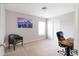 Bright office space with a desk and swivel chair at 5769 Marsh Glen Ct, Carmel, IN 46033
