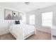 Cozy bedroom with modern decor, featuring natural light and comfortable furniture at 5769 Marsh Glen Ct, Carmel, IN 46033