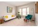 Bright living room with a bay window, comfortable seating and stylish accents, offering a cozy and inviting atmosphere at 5769 Marsh Glen Ct, Carmel, IN 46033