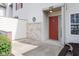 Charming front door with brick accents and a well-lit entry, enhancing curb appeal at 6014 Wildcat Dr, Indianapolis, IN 46203