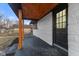 Covered patio and entrance with a view of the backyard and the house at 6470 Jackson St, Indianapolis, IN 46241