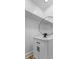 Modern vanity in this bathroom with a round mirror and black fixtures at 6470 Jackson St, Indianapolis, IN 46241