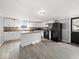 Eat-in kitchen with stainless steel appliances, and dining table at 718 Indiana Ave, Shelbyville, IN 46176