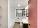 Updated bathroom featuring a tub with shower, vanity, and modern fixtures at 719 Howard Rd, Greenwood, IN 46142