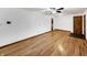 Bright living room features gleaming hardwood floors and fresh white paint at 719 Howard Rd, Greenwood, IN 46142