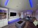 Open floor plan with LED lighting, lounge area, dining area, and kitchen at 802 N Meridian St # 205, Indianapolis, IN 46204