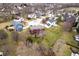 The property's backyard featuring a patio and mature landscaping in a quiet neighborhood at 8238 Armadale Ct, Indianapolis, IN 46236