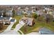 Beautiful two-story home featuring a three-car garage and mature landscaping at 8238 Armadale Ct, Indianapolis, IN 46236