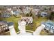 Drone shot of the property showcases a well-kept lawn, mature trees, and a quiet neighborhood setting at 8238 Armadale Ct, Indianapolis, IN 46236