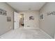 Neutral-toned bedroom with wall decor and carpeted floors, providing a comfortable atmosphere at 8238 Armadale Ct, Indianapolis, IN 46236