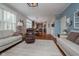 Open floor plan showcases the living room leading to the kitchen and dining area at 8238 Armadale Ct, Indianapolis, IN 46236