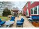 Relax on the expansive brick patio with comfortable seating, perfect for entertaining guests at 8238 Armadale Ct, Indianapolis, IN 46236