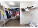 Organized walk-in closet with ample storage space for clothing, shoes, and accessories at 8430 Templederry Dr, Brownsburg, IN 46112