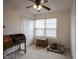 A bedroom featuring a window and neutral colored walls and carpet at 9769 Green Knoll Dr, Noblesville, IN 46060
