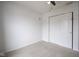An empty bedroom with neutral carpet and a ceiling fan and a closet at 9769 Green Knoll Dr, Noblesville, IN 46060