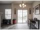 A dining area featuring light gray wood-look floors, and a sliding glass door at 9769 Green Knoll Dr, Noblesville, IN 46060