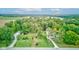 An aerial view of the property showcasing lush greenery, mature trees, and a sprawling lawn at Vacant Lot 0 - 5750 W 650 N, Thorntown, IN 46071