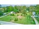 Spacious grassy yard featuring mature trees, trimmed evergreens and other foliage at Vacant Lot 0 - 5750 W 650 N, Thorntown, IN 46071