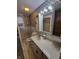 Bathroom featuring a marble top vanity and bright lighting at 1001 S Anderson St, Elwood, IN 46036