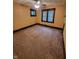 Cozy bedroom with a ceiling fan and natural light at 1001 S Anderson St, Elwood, IN 46036