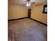 Bedroom featuring a ceiling fan and original woodwork at 1001 S Anderson St, Elwood, IN 46036