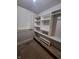 Walk-in closet with built-in shelving and ample storage at 1001 S Anderson St, Elwood, IN 46036