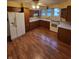 Functional kitchen with ample cabinet and countertop space at 1001 S Anderson St, Elwood, IN 46036